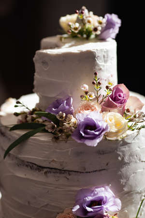 Wedding cake closeup at a real reception and the end of the party - Closeup