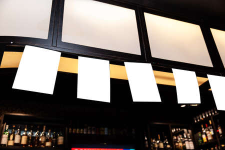 Blank ad Mock up frame on the blurred background of the bar - Empty space for advertisement