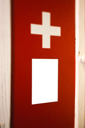 Red first aid cross - Light box display with white blank space for advertisement - Indoorの写真素材