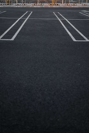 Empty parking lots during Golden Hour sunset at a popular typical Shopping centre