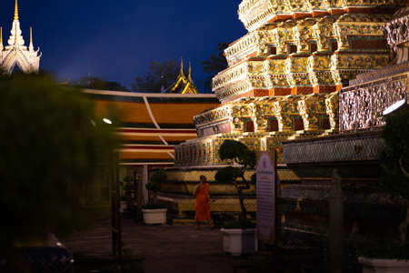 BANGKOK, THAILAND - APRIL 6, 2018: Wat Pho buddist temple - Decorated in gold and bright colors...