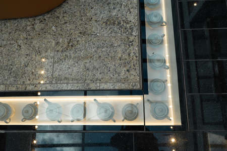 Shopping mall decoration - Tea pots under a glass floor