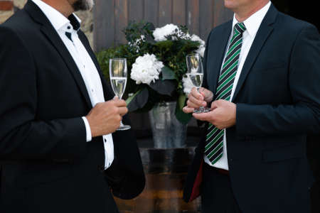 Business party conference in Eastern European Baltic Riga Latvia - Cocktail drinks close up and people chattingの写真素材