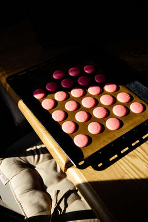 French macaroon cooking master class in a kitchen with various people and different angles in Eastern European Baltic Riga Latviaの写真素材