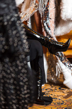 Shiny show girls with crazy black and white leather and feather outfits with crystals in Eastern Europe Latvia Riga corporate eventの写真素材