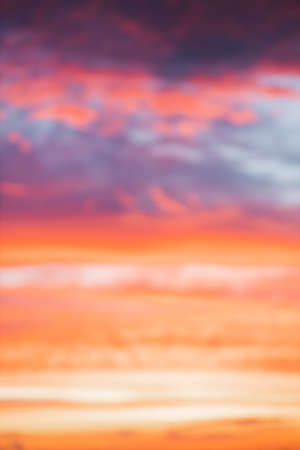 City skyline on vivid abstract sunset sky background