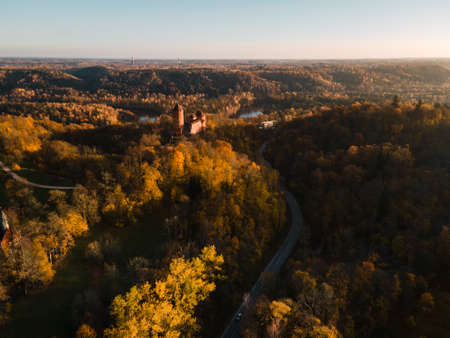 Establishing wide shot: Flight to scenic Turaida castle in Autumnの写真素材