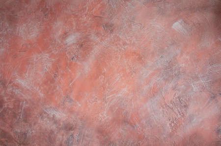 decorative plaster with a beautiful texture in pink tones interior wallの写真素材