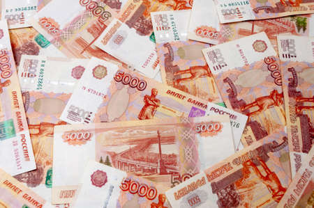 A lots of russian 5000 roubles banknotes background finance concept