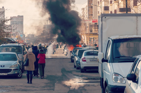 Krasnodar, Russia - November 24 2021: Firefighters attack a propane fire. Fireman Putting Out Fire. Firemen extinguishing a car fireのeditorial素材