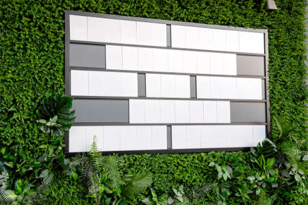 Modern board with copy space for words or messages over gray background.