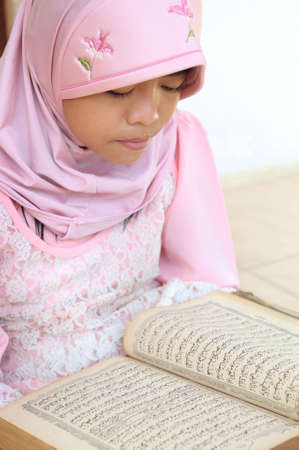 Muslim Girl Reading Koranの写真素材