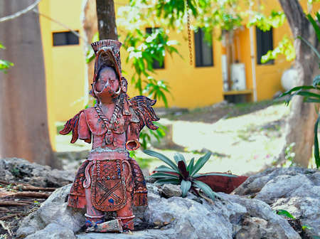 Souvenirs at Chichen Itza objects of worship and traditional art made of high quality brightly...