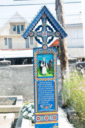 Cross from the Merry Cemetery in Sapanta Maramures the only place in the world where people laugh at...