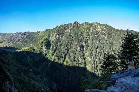 The Fagaras Mountains represent a mountainous massif that is part of the Southern Carpathians,and in which is the highest mountain peak in Romania, the Moldoveanu peak,with an altitude of 2,544 metersの写真素材