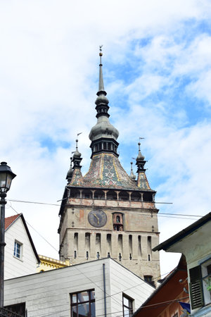 The clock tower in Sighisoara is the main gate of the fortress and the largest of the defense towers which until 1575 was the seat of the City Hall,then was the court,today hosting the History Museumの写真素材