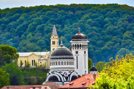 The Roman Orthodox Church, a place of worship, has the shape of a nave oriented east-west and is...