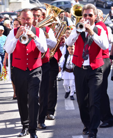 Hermannstadt marching band consisting of wind and percussion musicians dressed in uniforms...