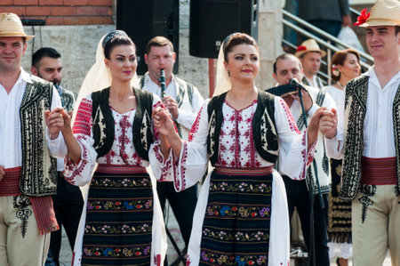 Professional dancers in folk costume fromGorj on city days,public event that does no require accreditation,costume is composed of ie,skirt,valnic or sのeditorial素材