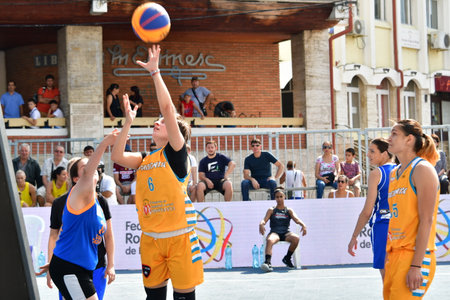 Demonstration basketball game at TARGU JIU City Days,public event that does not require accreditation.Game is organized in central square of  city on  improvised fieldのeditorial素材