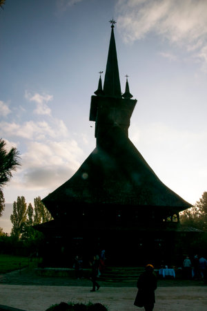 Silhouette of an old church in the middle of the forestの写真素材