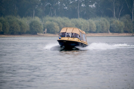 Boat on the river in the summer. Water transport on the river.