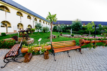 Wooden bench in the garden, square in Prague, Czech Republicの写真素材