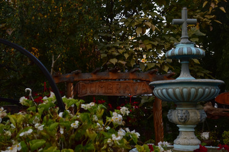 Ornamental fountain in the courtyard of the old house in the cityの写真素材
