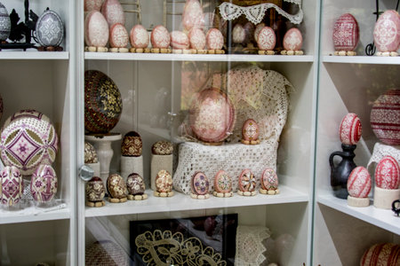 Decorated Easter eggs on a shelf in a shop window.の写真素材