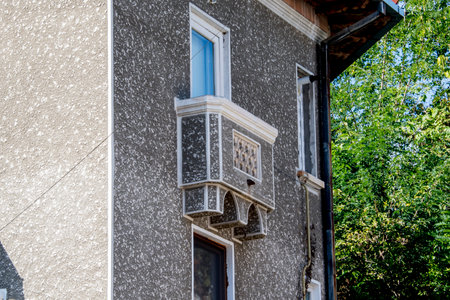 Detail of the facade of an old house in the city.の写真素材
