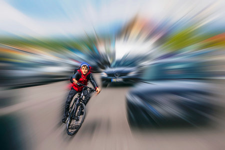 Cyclist Riding the Road on a Blurred Background. Extreme sports concept.の写真素材