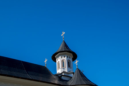 Roof of a church against the blue sky. Religion concept.