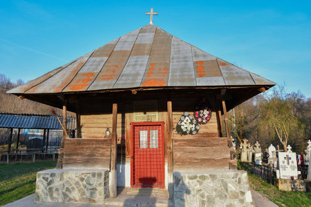 Old wooden church in the village of RoÈia de Amaradia Romaniaの写真素材