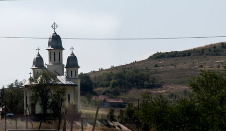 church in a village in the mountains, photo as a background, digital imageの写真素材