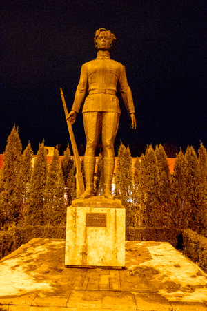 Statue in the park at night, Chengde, Hebei Province, China.の写真素材