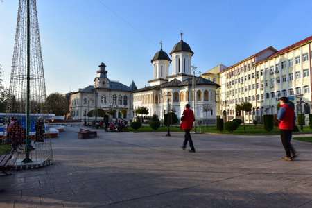 People walk in front of a cathedral in Kiev, Ukraine