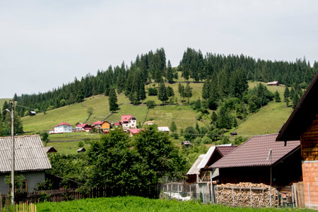 mountain village in Carpathian mountains, Romania summer landscapeの写真素材