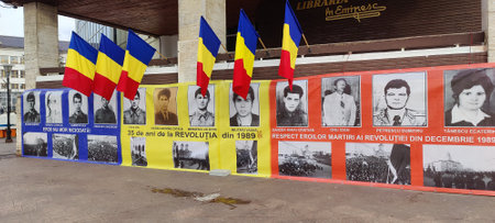 Flags with flags of Romania on the wall.
