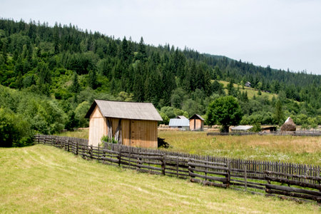 Old wooden houses in the Carpathian mountains.の写真素材