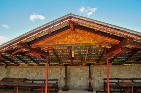 Wooden gazebo on the background of the blue skyの写真素材