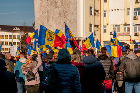 Unidentified people with flags at the demonstration in support of Ukraine.の写真素材