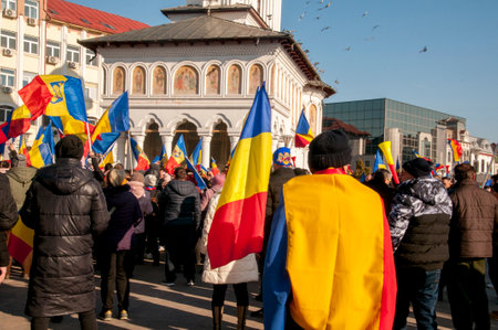 Unidentified people with flags at rally against Russian invasion of Ukraine.の写真素材