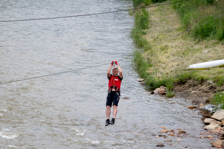 A young person is engaged in extreme sports in water.の写真素材