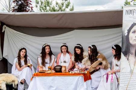 Unidentified people in traditional Ukrainian clothes at the festival of national culture.の写真素材