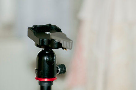Close-up of a tripod, blurred background
