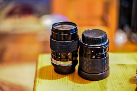 Vintage camera lens on the table. Shallow depth of fieldの写真素材