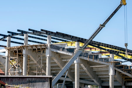 construction of a new modern multi-storey building with a crane