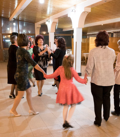 Group of diverse people dancing together in a dance class at a schoolの写真素材