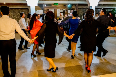 Group of business people having fun and dancing in a modern office.の写真素材