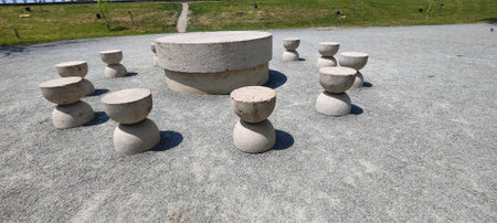 Stone sculpture on the ground in the park, closeup of photoの写真素材